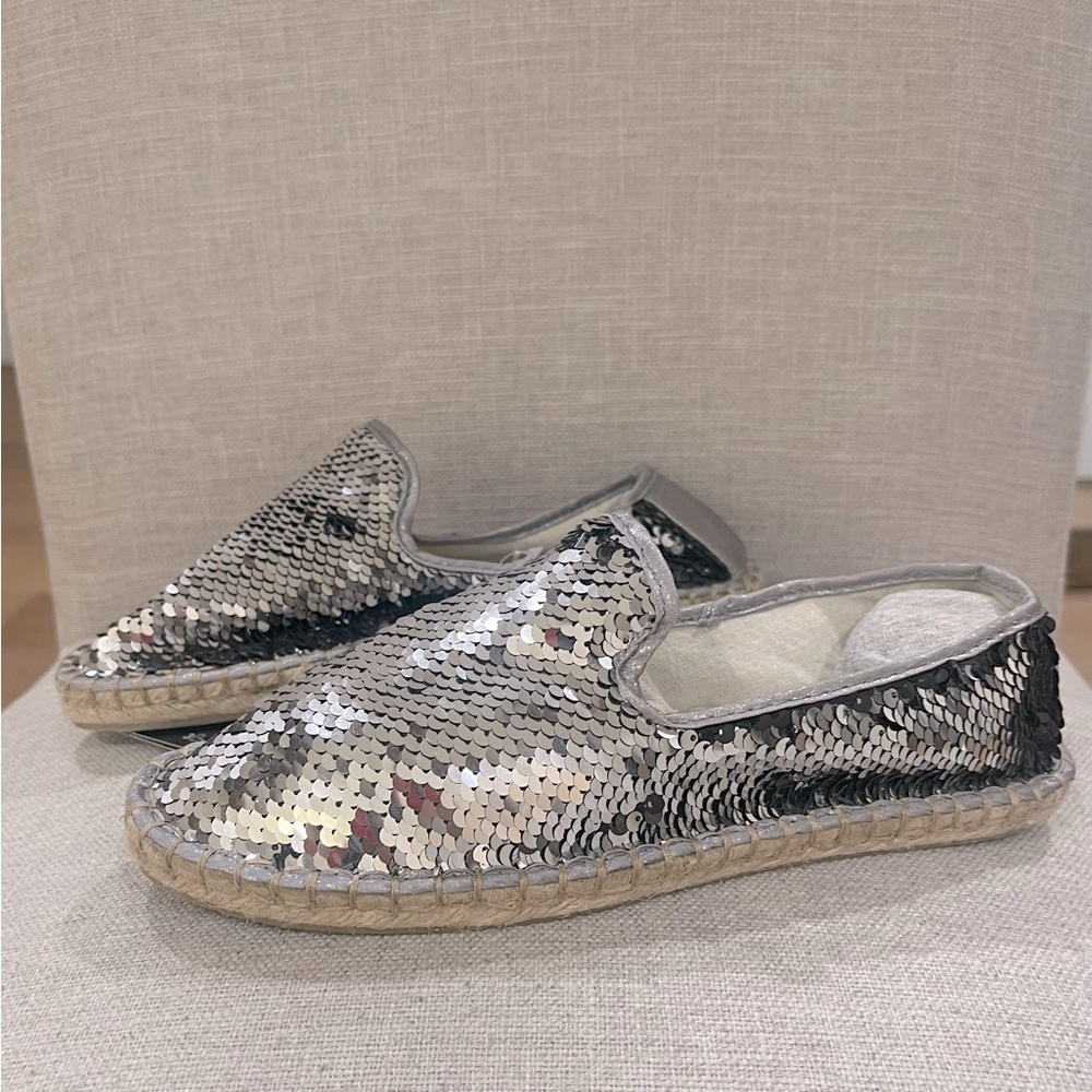 From Capri, Italy silver sequins flat espadrilles.